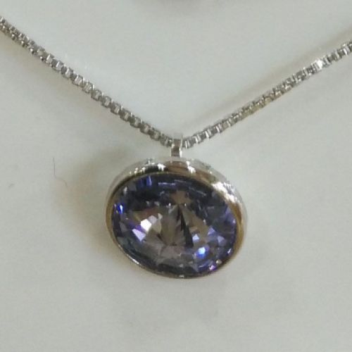 Colgante con pedrería y plata